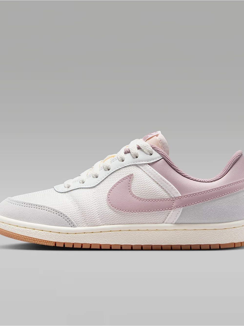 Jordan Women's Low-Top Sneaker in White and Light Pink